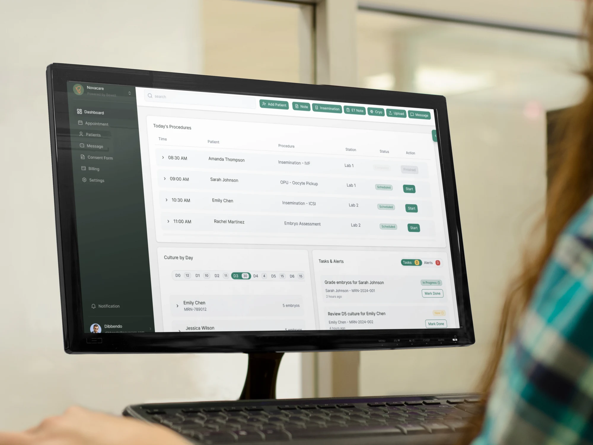 Embryologist using the dashboard in a clinical workspace